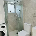 White 1-bdr Agyos Tychonas